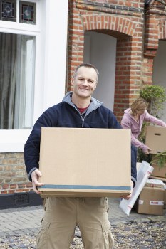 Furniture being carefully moved through a Haggerston property