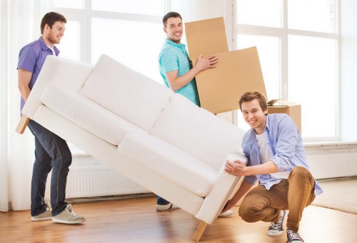 Organised moving day with packed boxes and furniture ready for storage or delivery