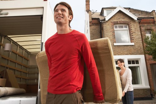 Office furniture being relocated during a Haggerston business move